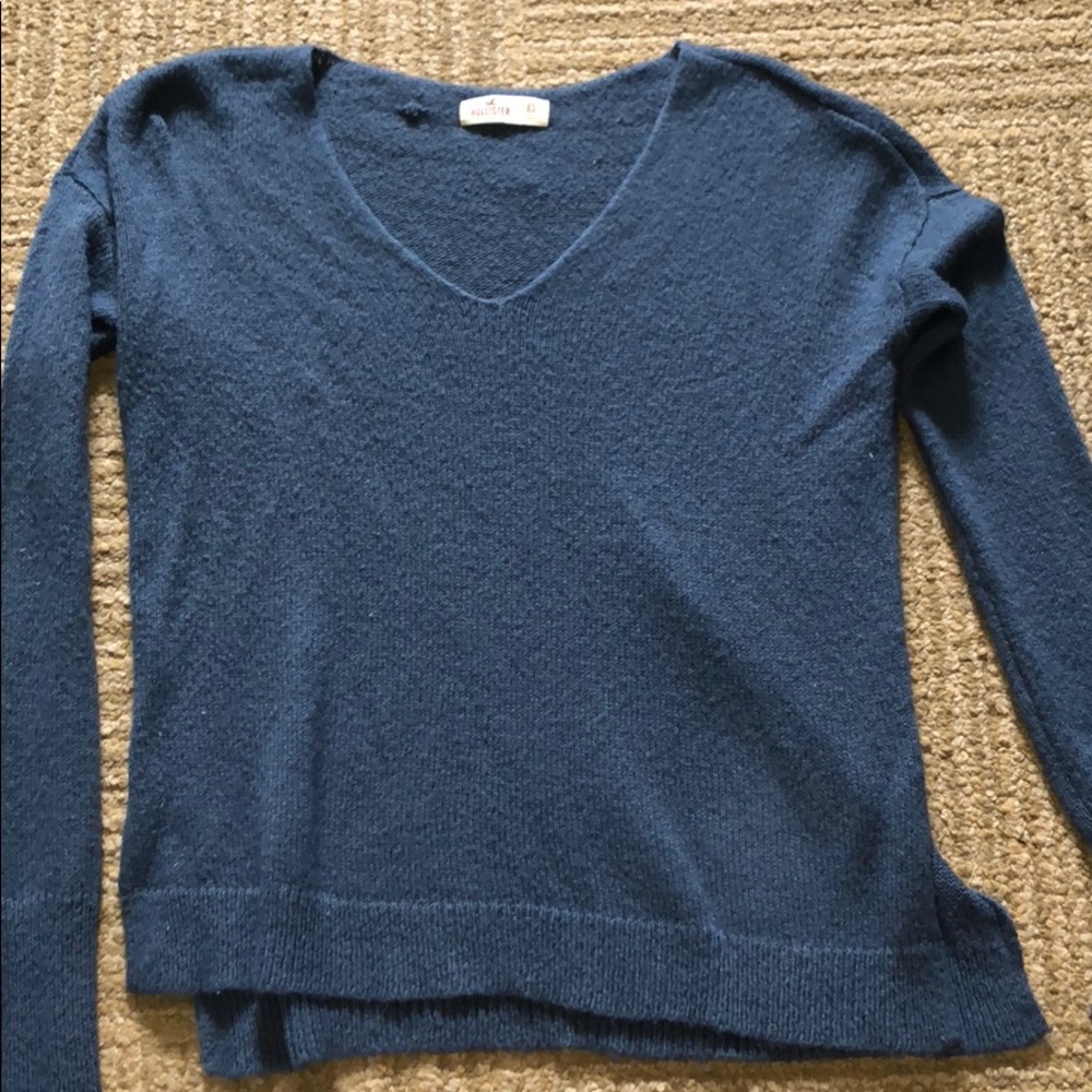 A blue Hollister sweater